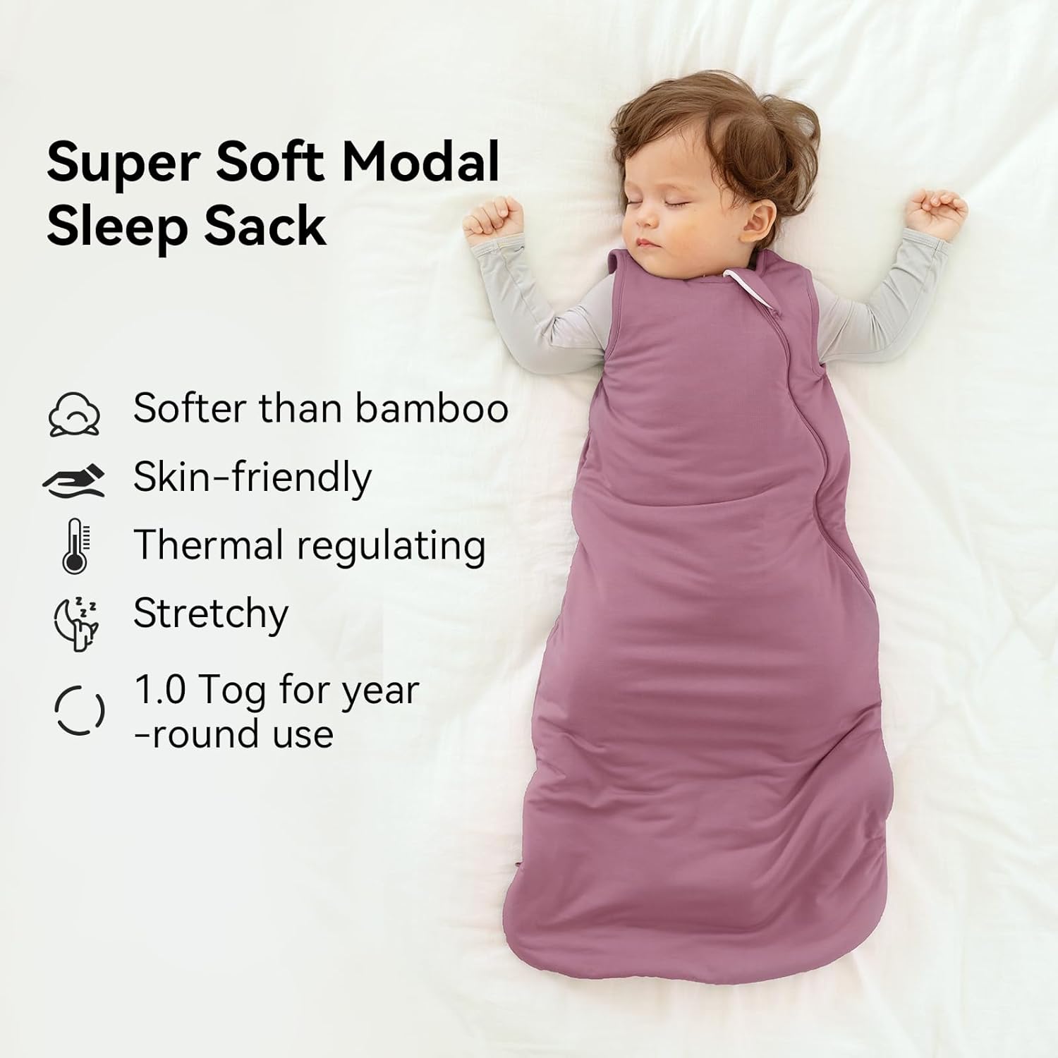 Peaceful baby sleeping in a BubblePanda Mulberry Silky Modal sleep sack showing its buttery-soft and breathable fabric texture