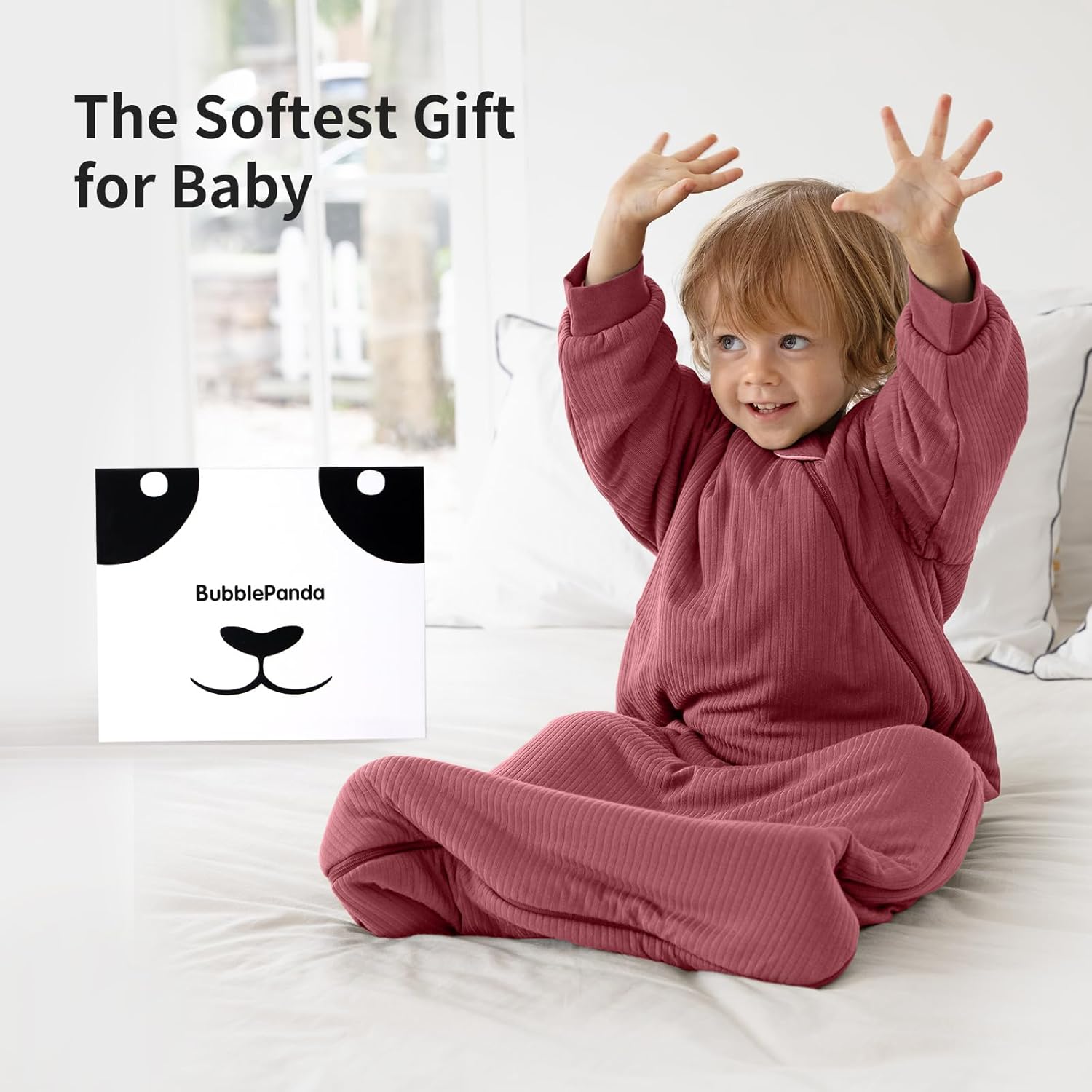Baby sleeping soundly in a BubblePanda Dusty Rose 1.5 TOG long sleeve 250 GSM bamboo sleep bag