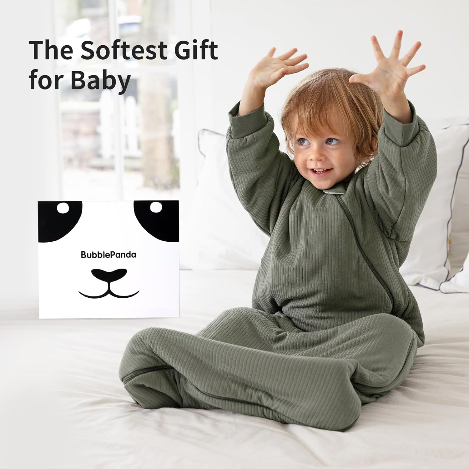 Baby sleeping soundly in a BubblePanda Olive Drab 1.5 TOG long sleeve 250 GSM bamboo sleep bag